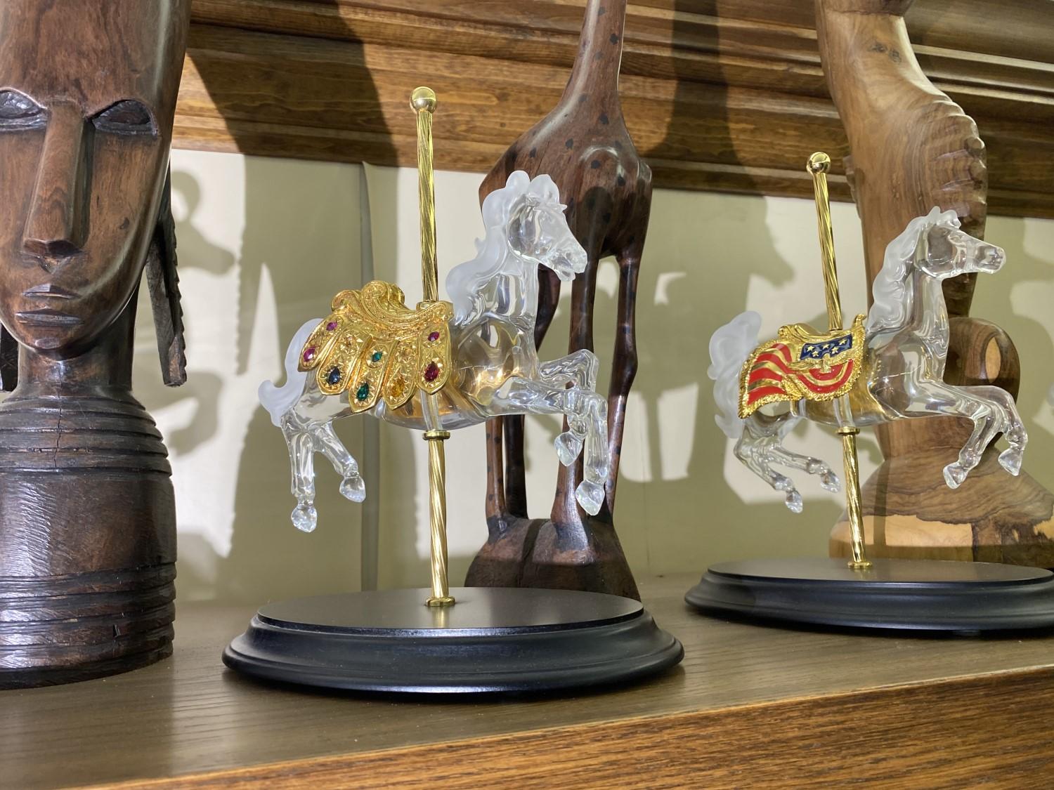 Glass or crystal carousel horses on top shelf - William Dentzel III