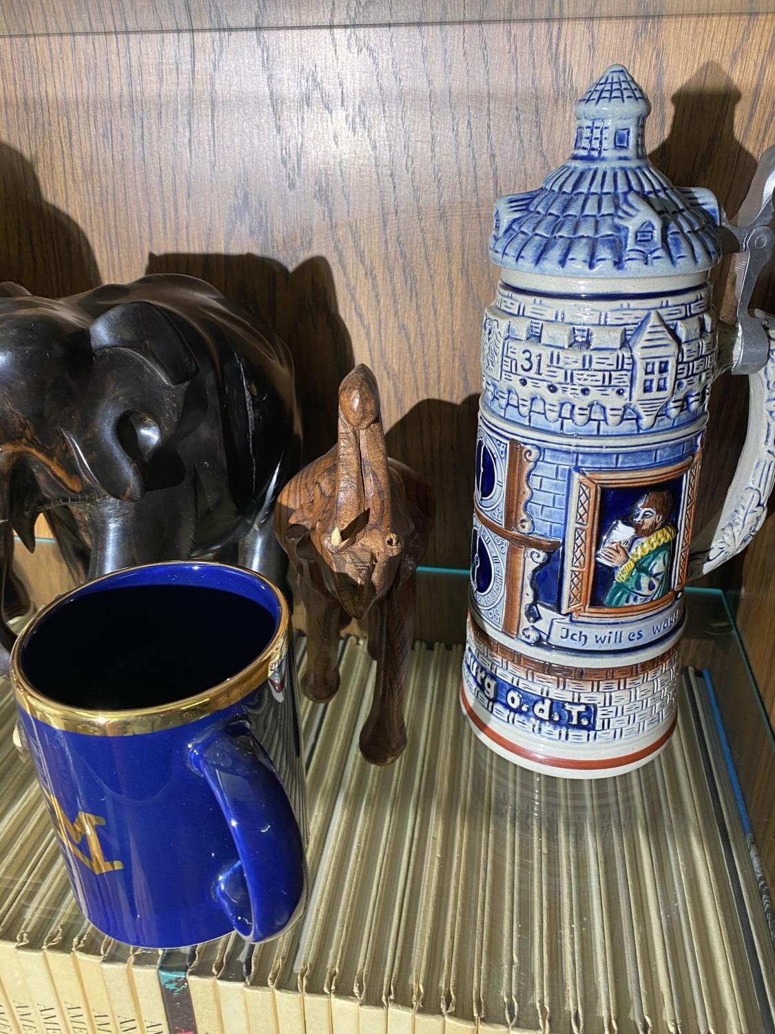 Group lot of assorted Carved elephants, Steins
