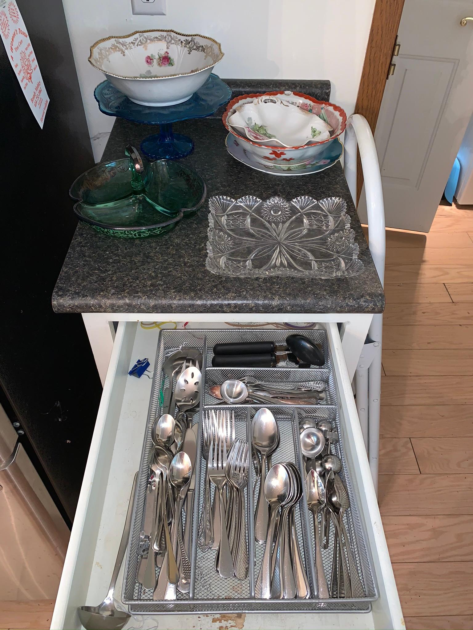 Assorted glassware, step stool, and flatware