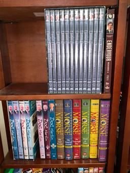 Large group of DVDâ€™s, Cdâ€™s and 2 shelves