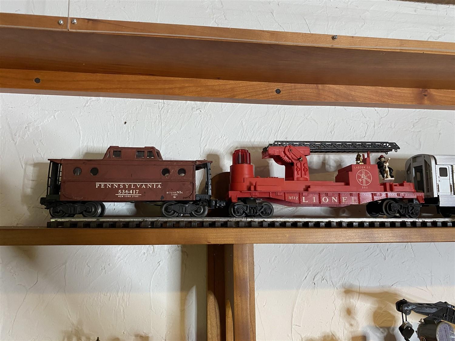 Vintage Lionel Model railroad cars including metal