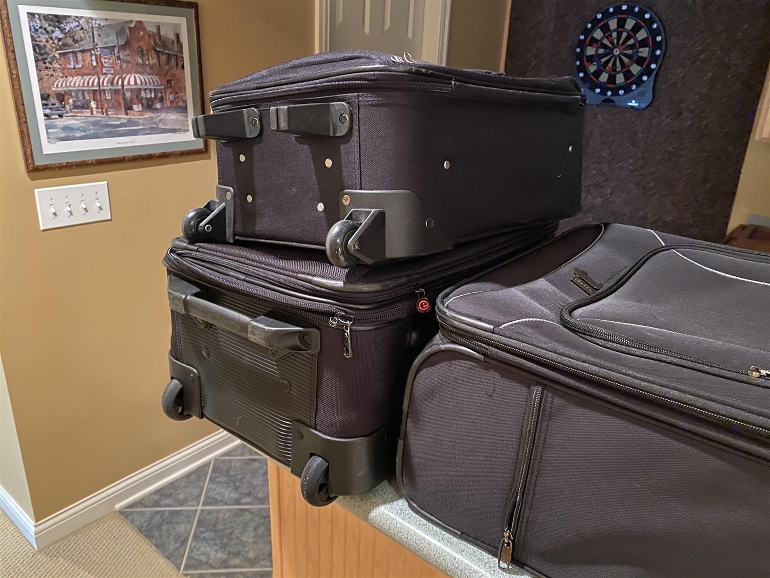 Group lot of assorted luggage