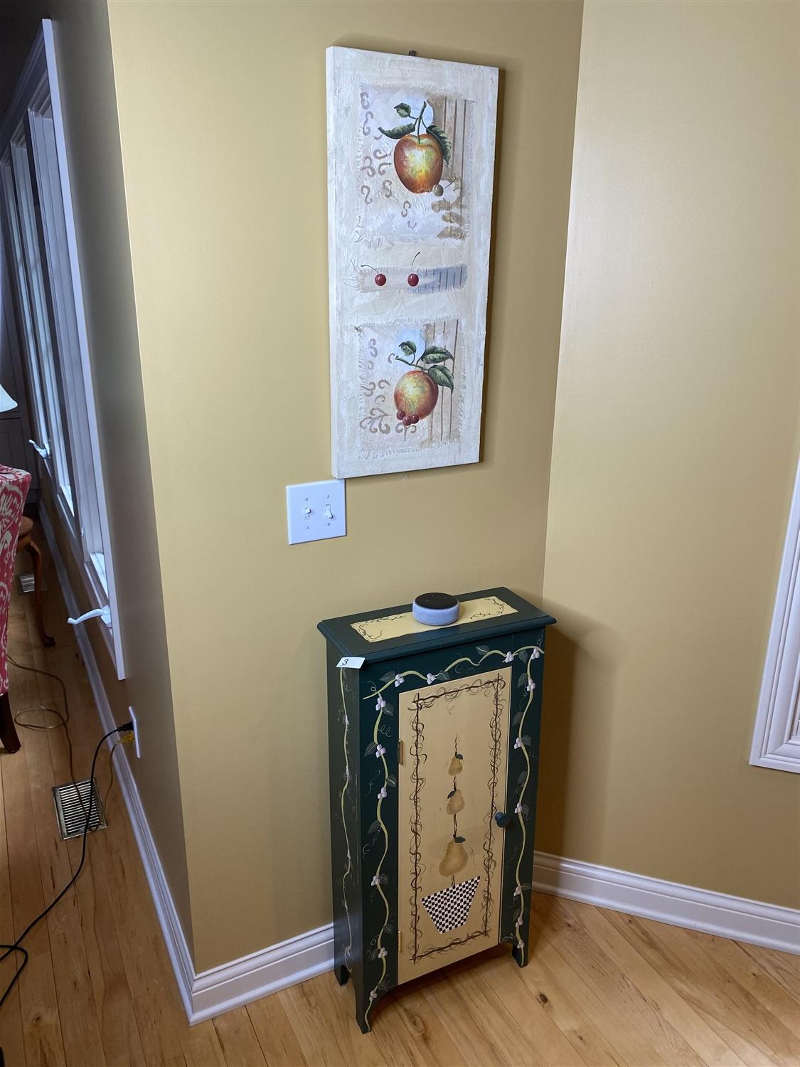 Wall art piece and small decorated cabinet