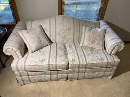 Pair of vintage light colored upholstered couches