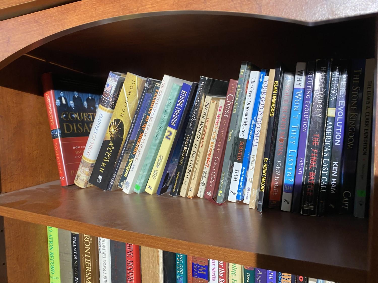 Contents of three shelves - books