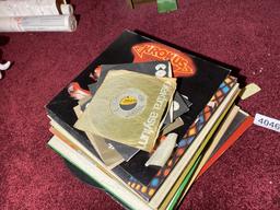 Stack of vintage records and sleeves
