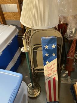 Old flags, totes of xmas, folding chairs and more lot