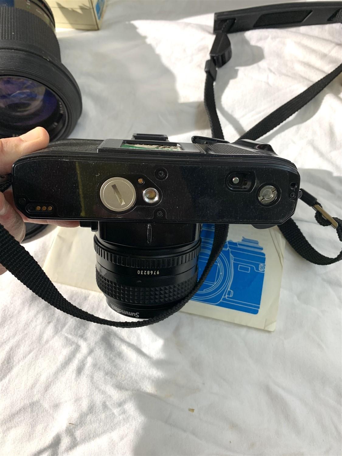 Vintage Minolta X-700 Camera with Additional Lens