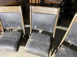 Group of three antique folding theater seats