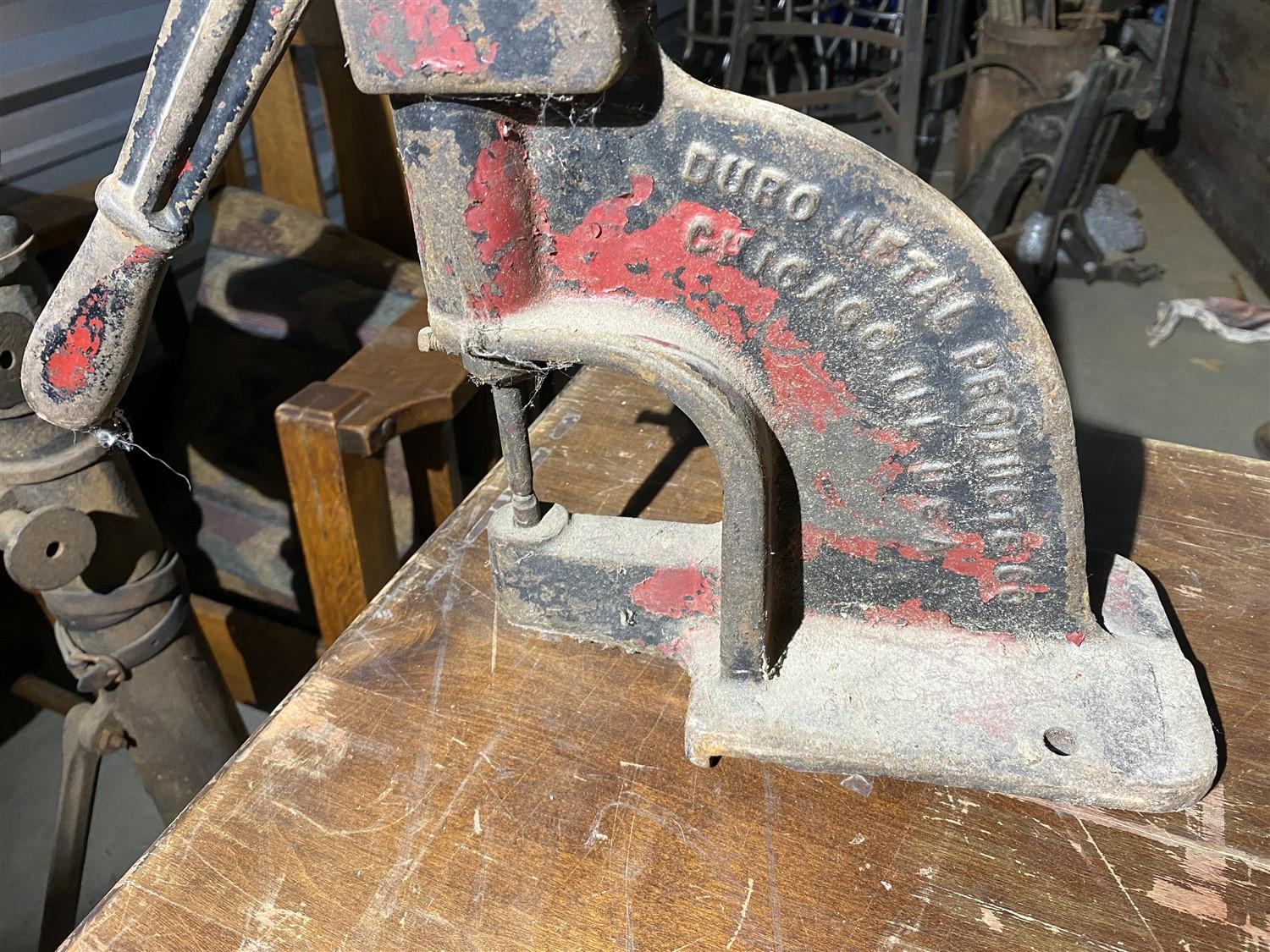 Antique industrial grinder and rivet press