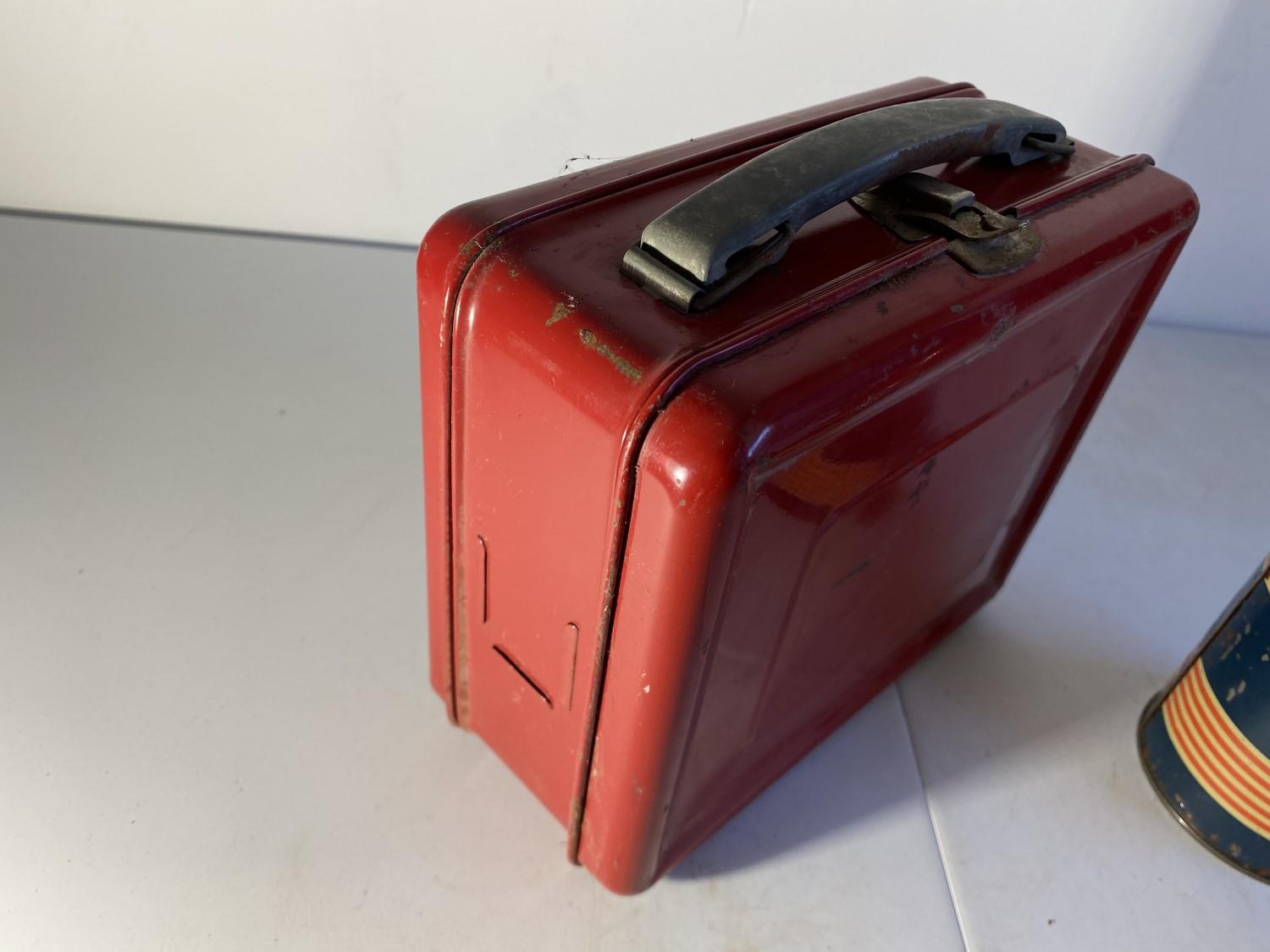 Vintage red metal lunchbox and thermos