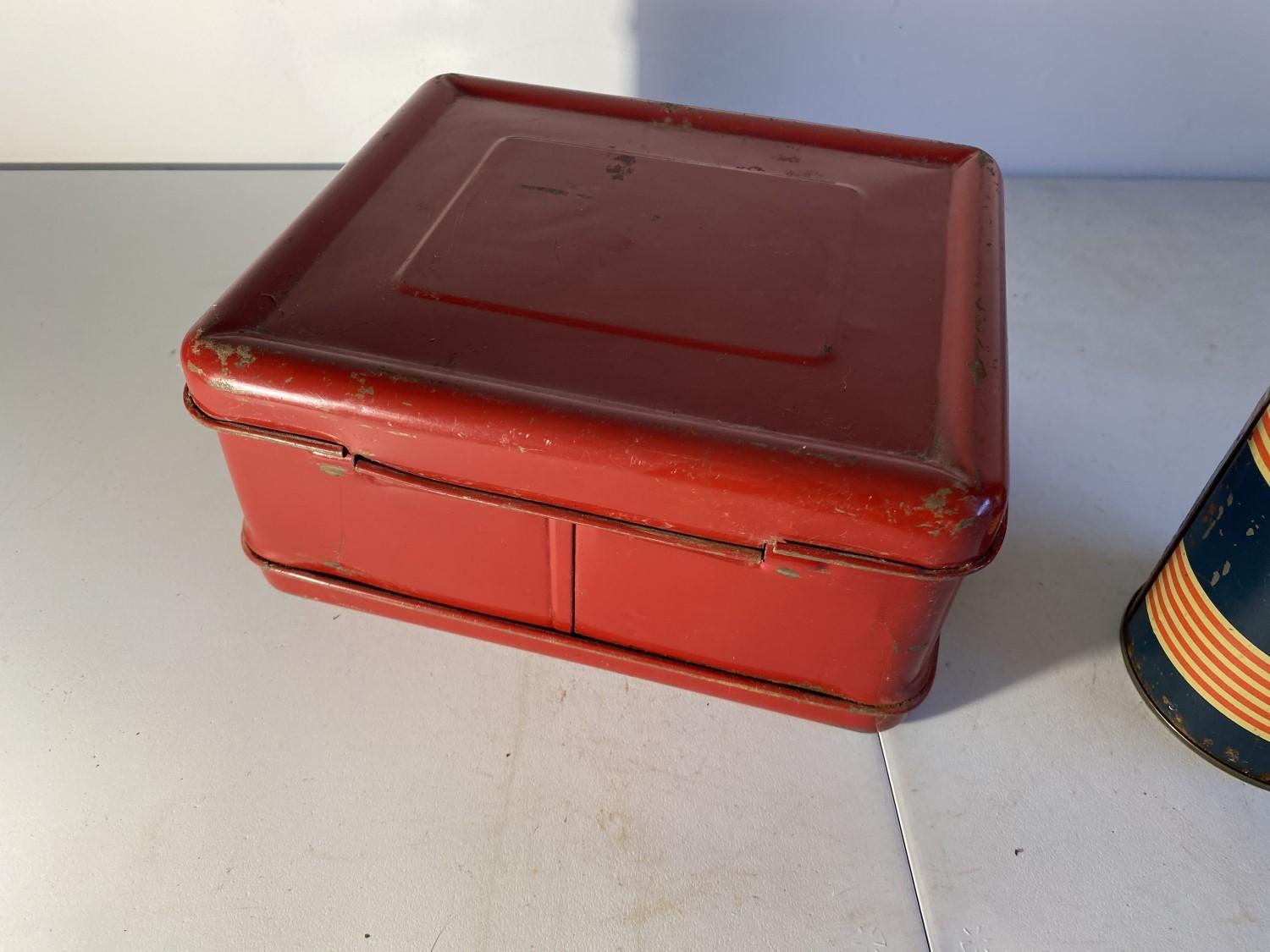 Vintage red metal lunchbox and thermos