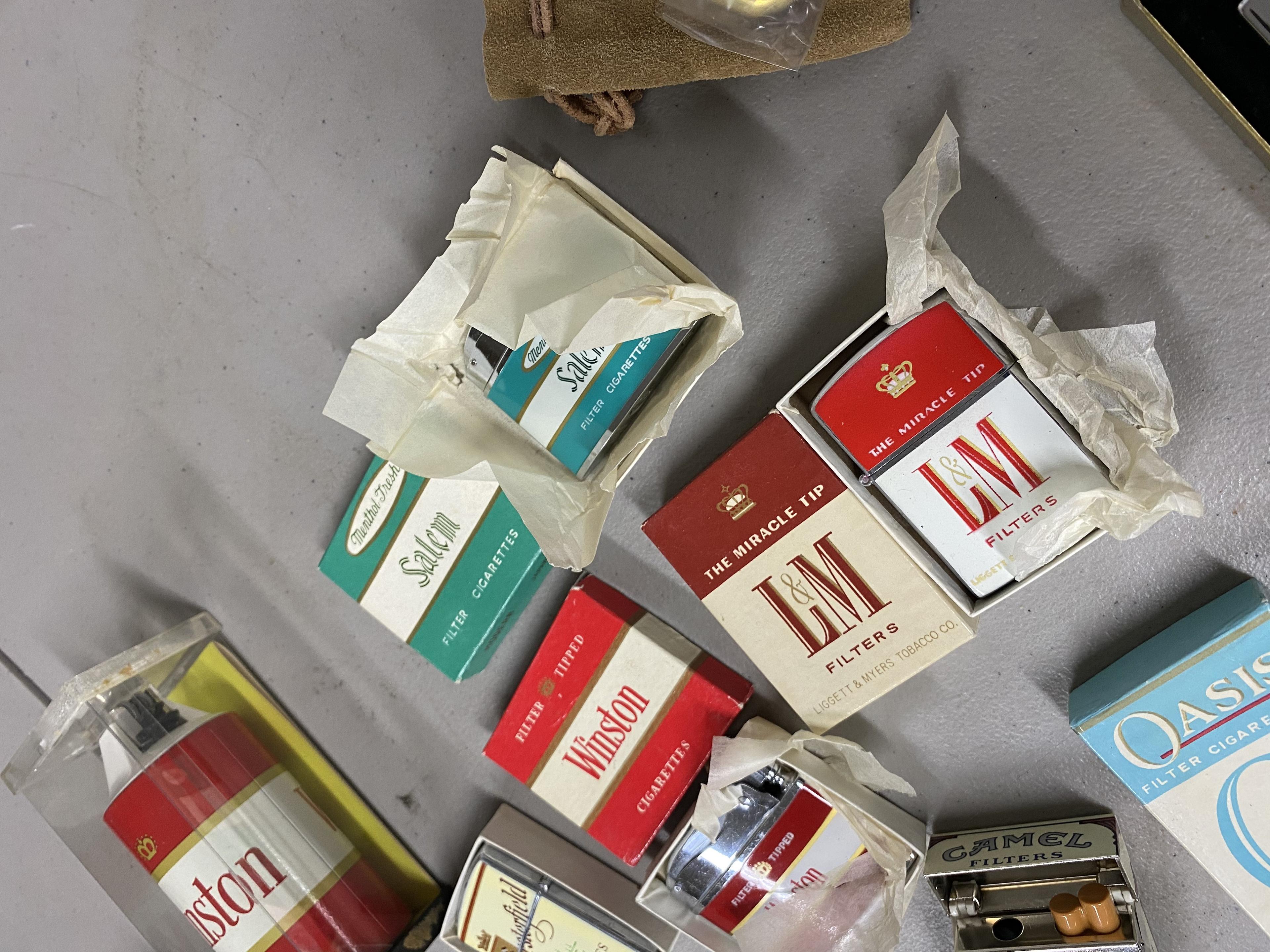 Large lot of vintage Cigarette Advertising Lighters