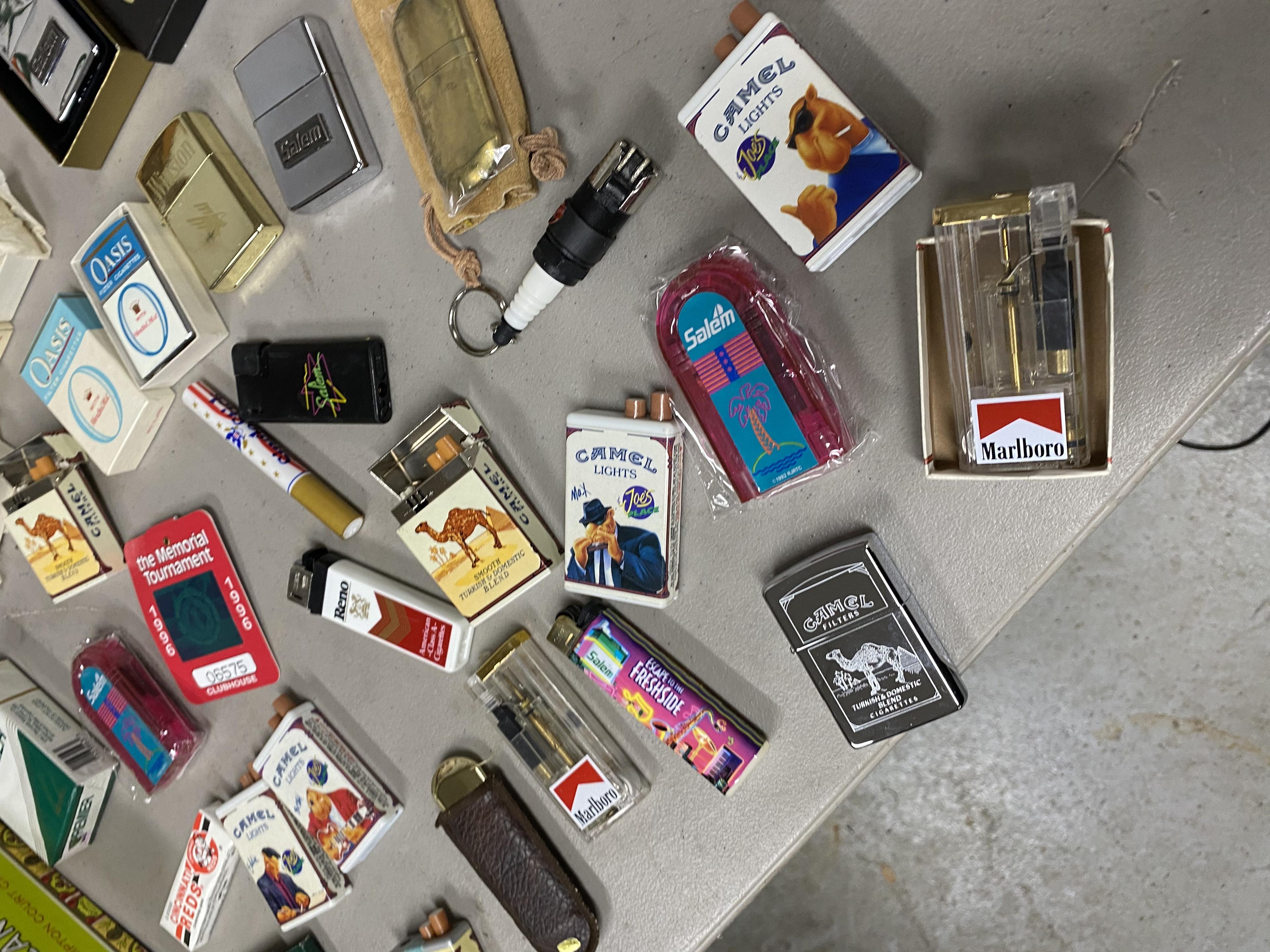 Large lot of vintage Cigarette Advertising Lighters