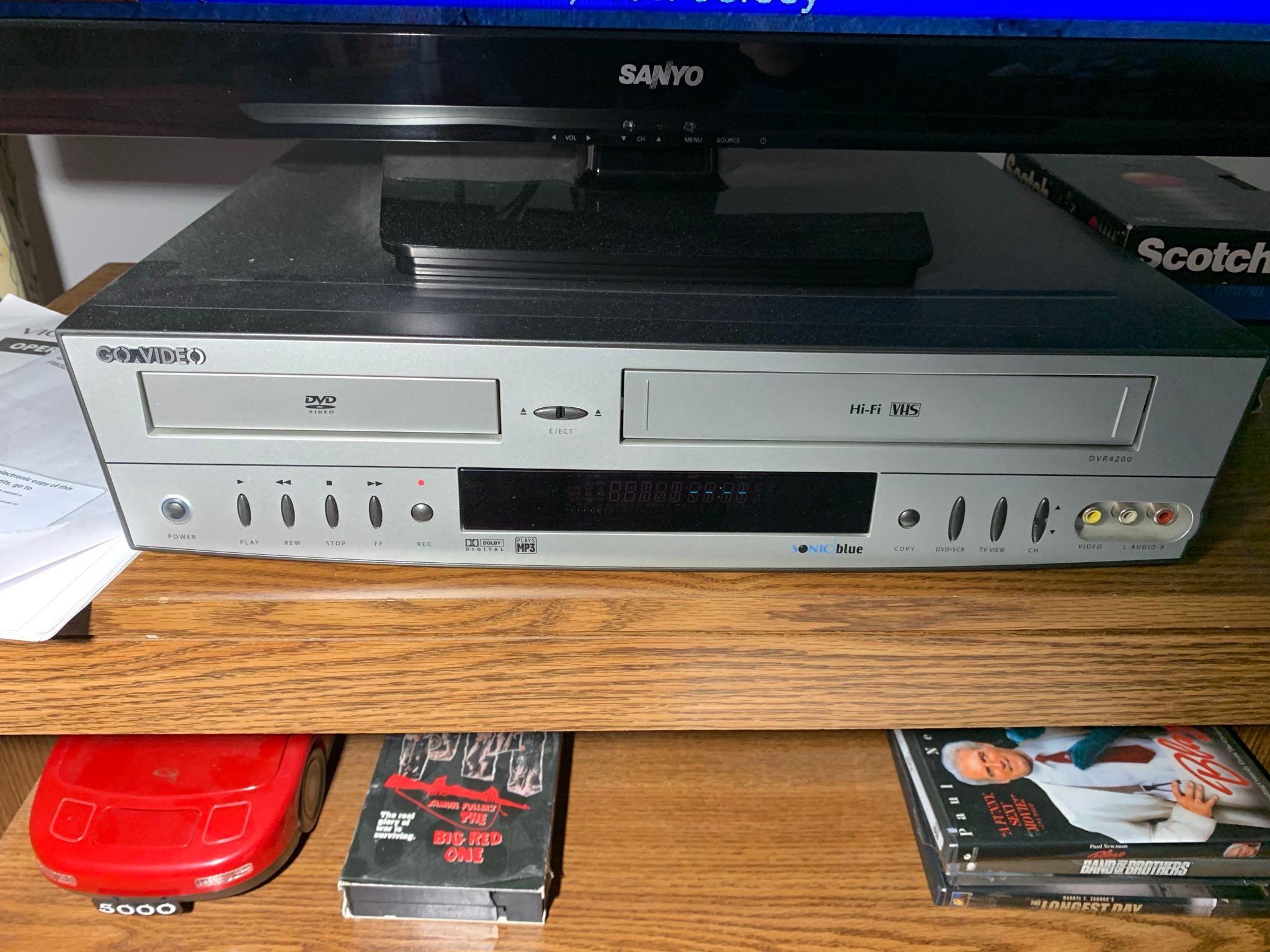 32 inch Sanyo Tv with Remote, Tv stand, DVD/VHS Combo Player and More