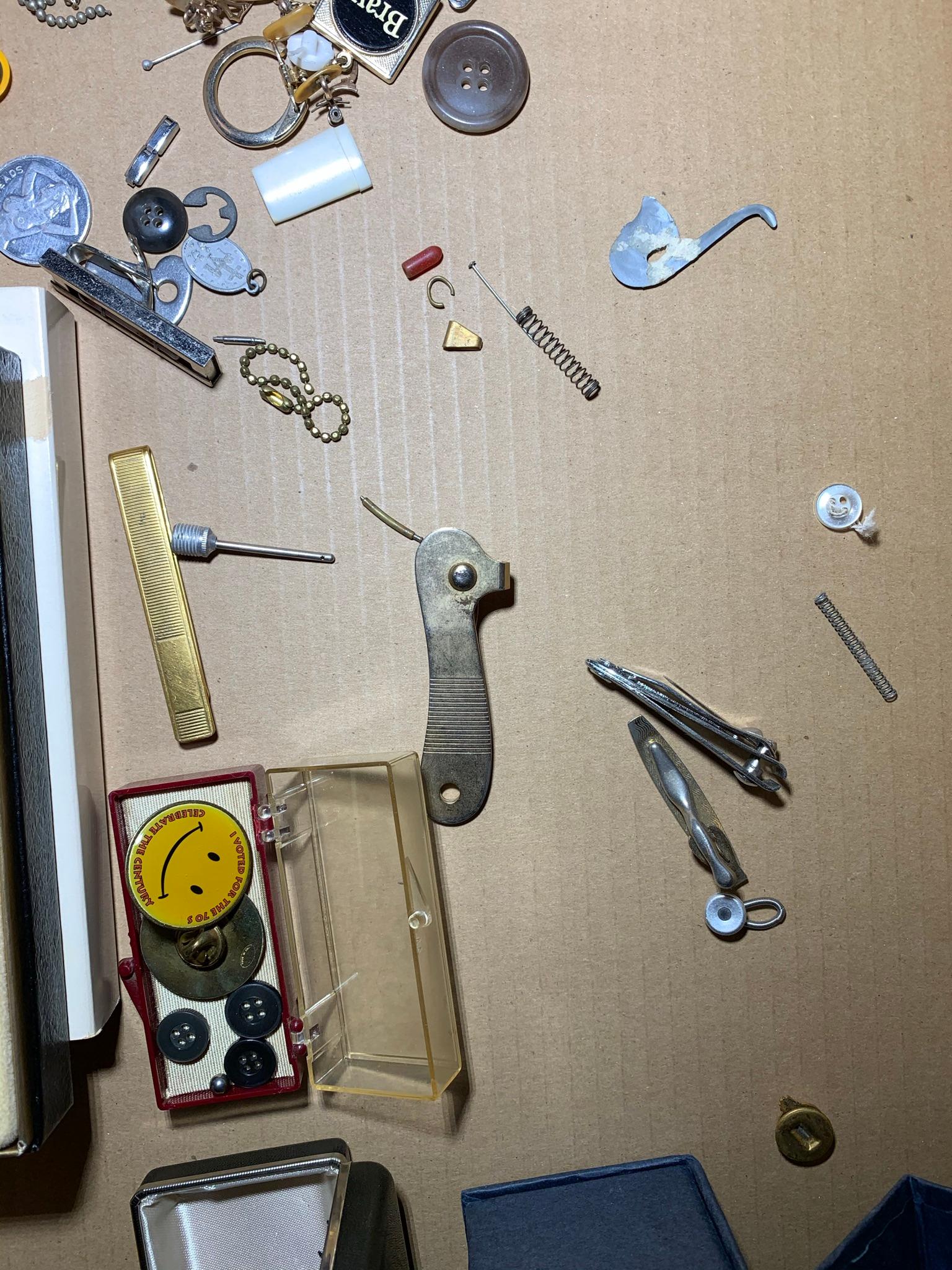 Assortment of Jewelry, Cap Gun, Pens, & More