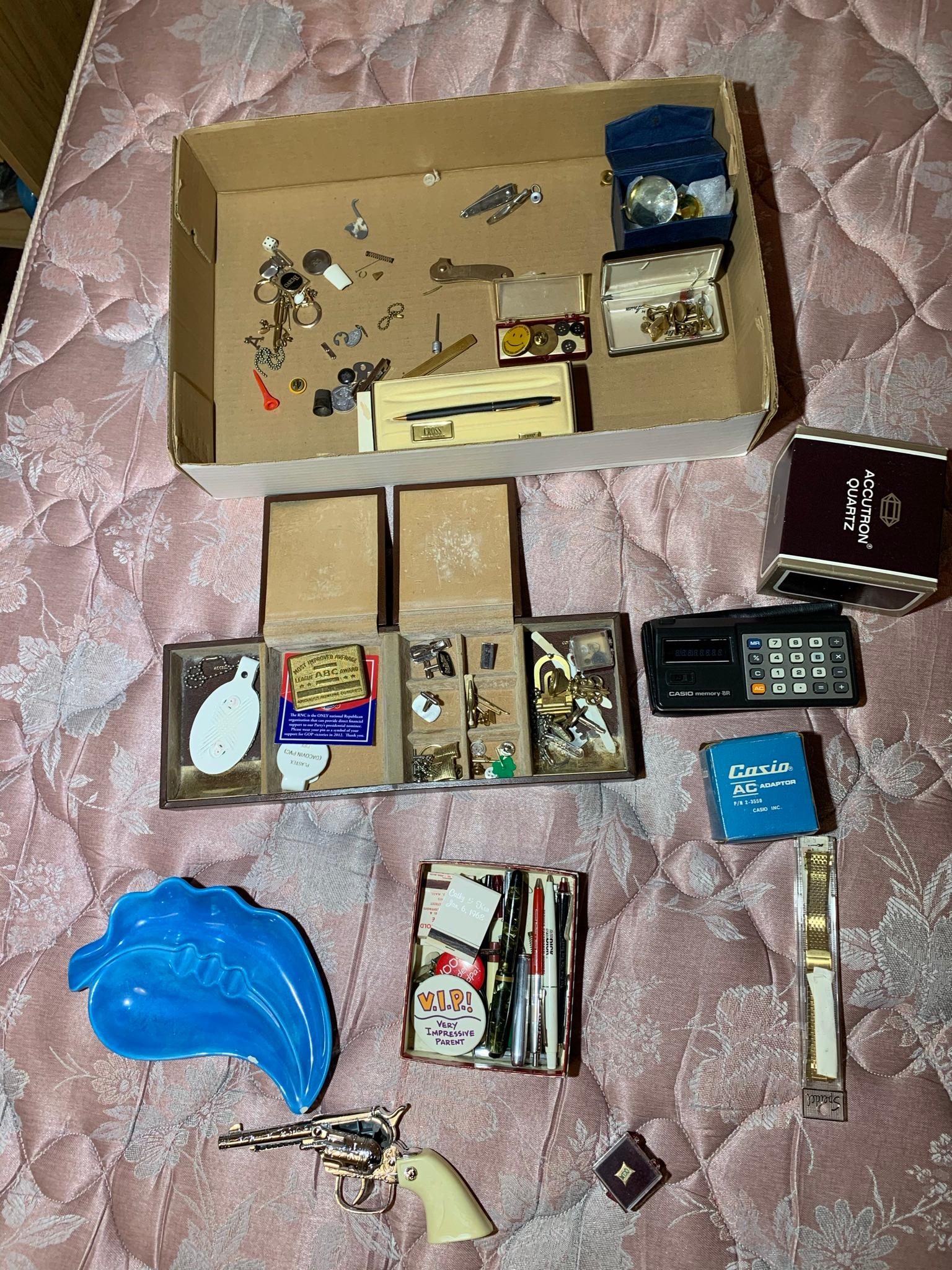Assortment of Jewelry, Cap Gun, Pens, & More