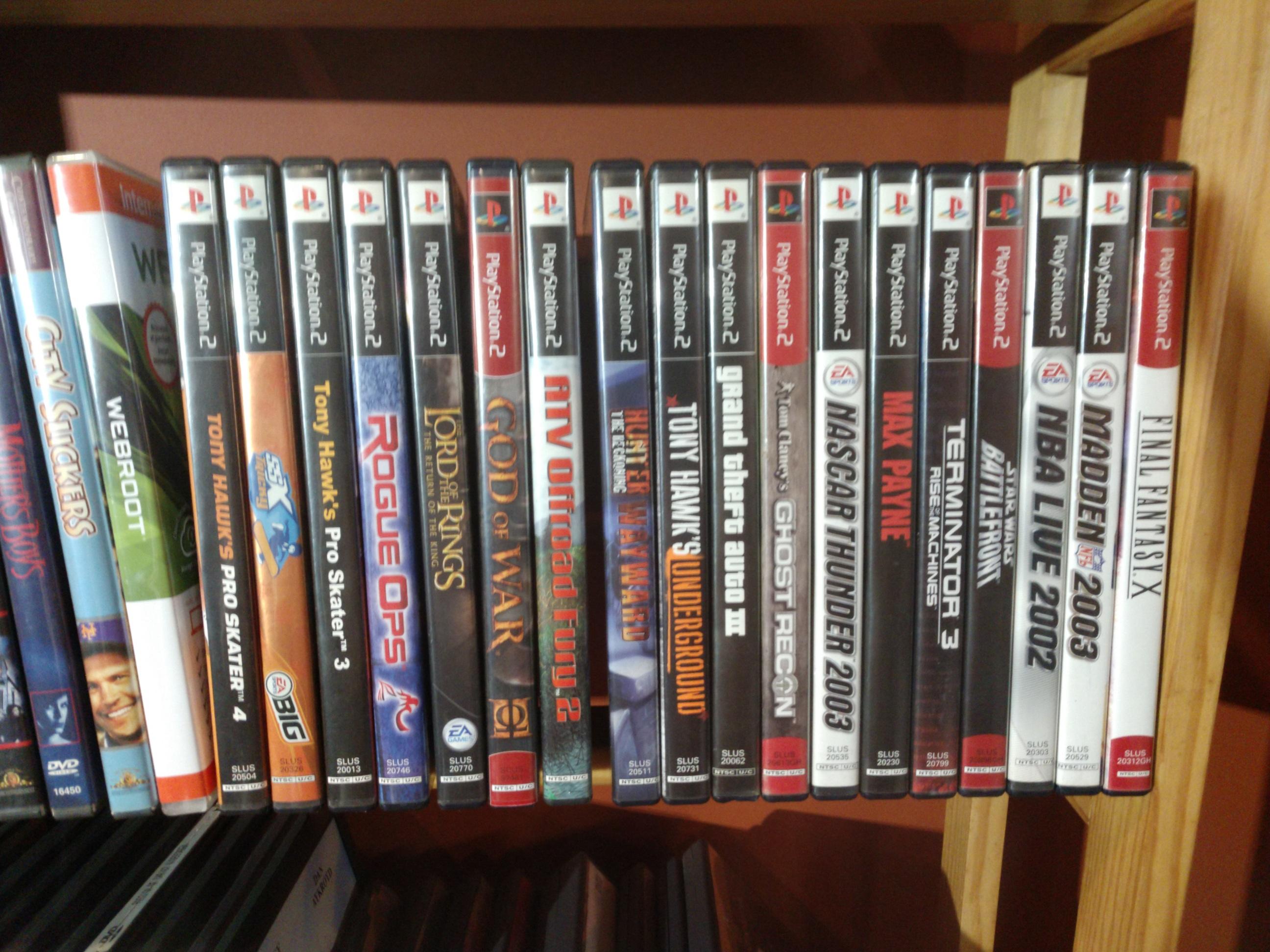 Huge Collection of DVD's, Playstation 2 Games, CD's, Books, Phones  and Shelving