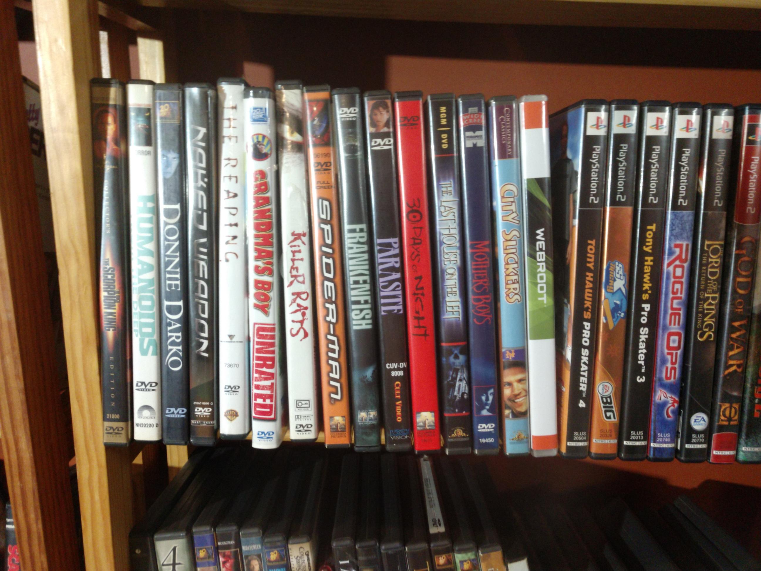 Huge Collection of DVD's, Playstation 2 Games, CD's, Books, Phones  and Shelving