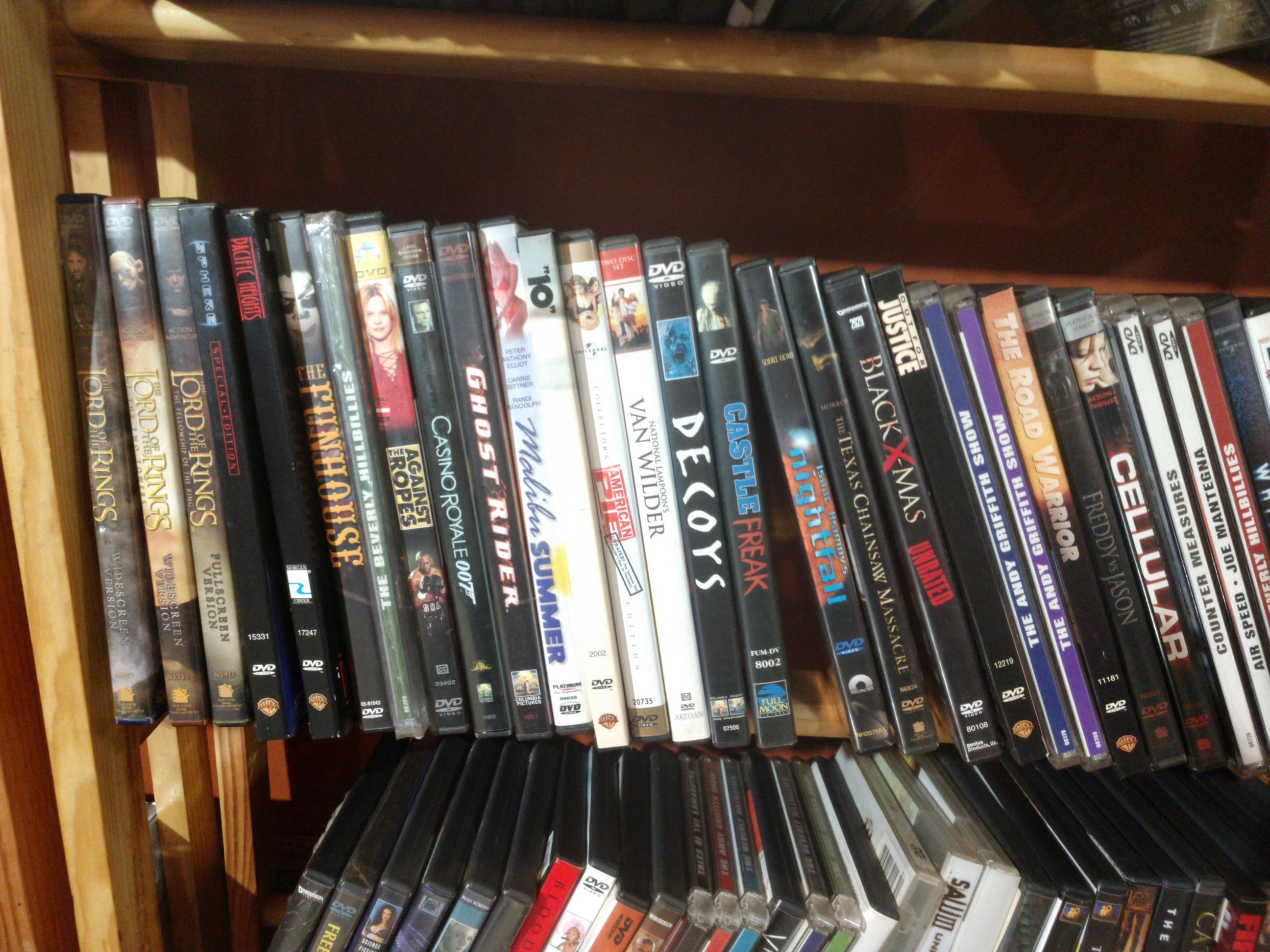 Huge Collection of DVD's, Playstation 2 Games, CD's, Books, Phones  and Shelving