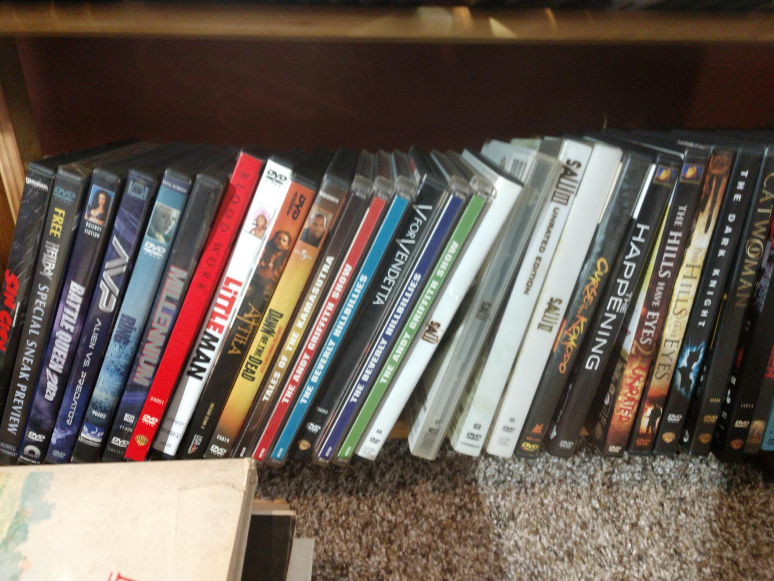 Huge Collection of DVD's, Playstation 2 Games, CD's, Books, Phones  and Shelving