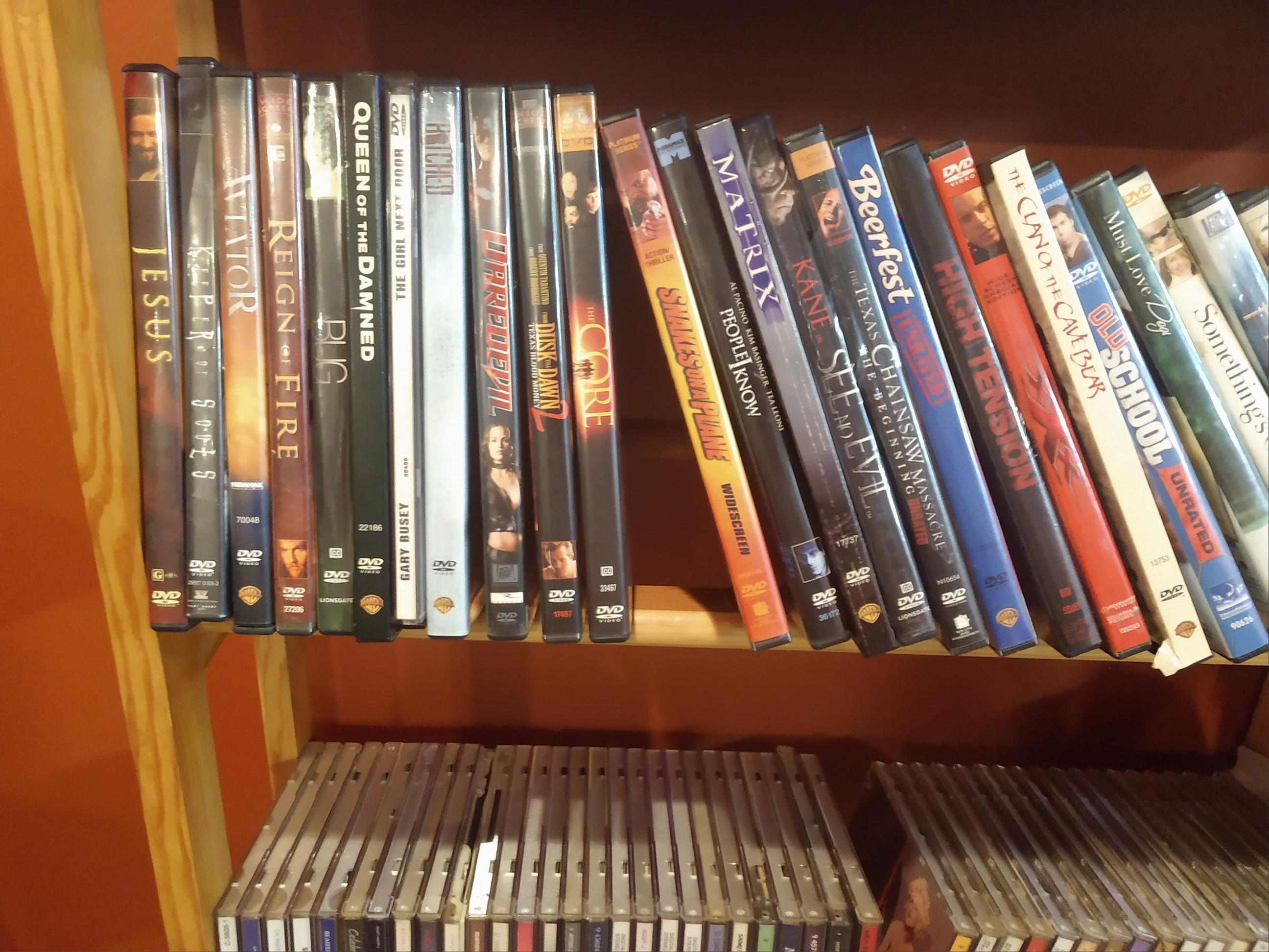 Huge Collection of DVD's, Playstation 2 Games, CD's, Books, Phones  and Shelving