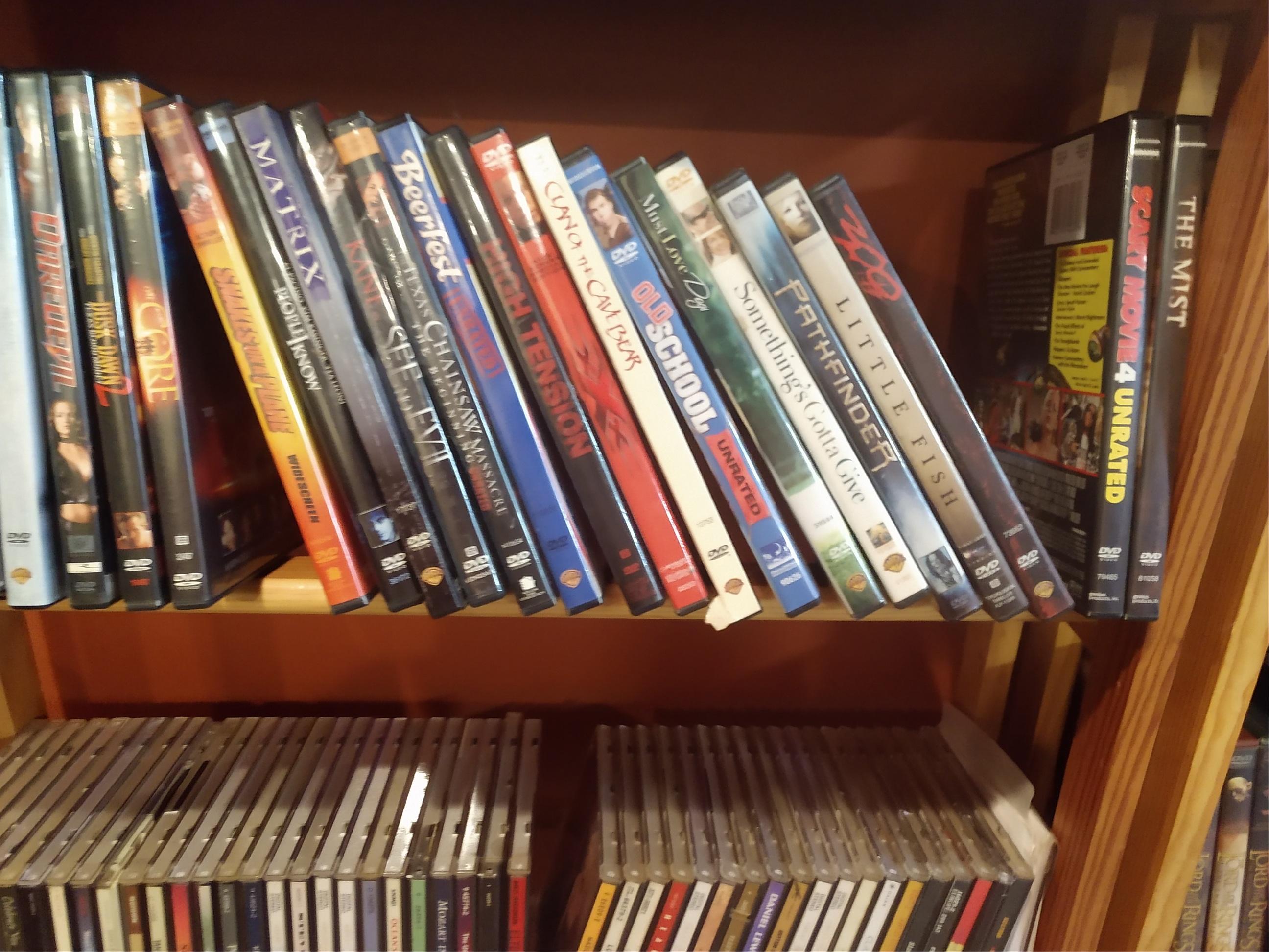 Huge Collection of DVD's, Playstation 2 Games, CD's, Books, Phones  and Shelving