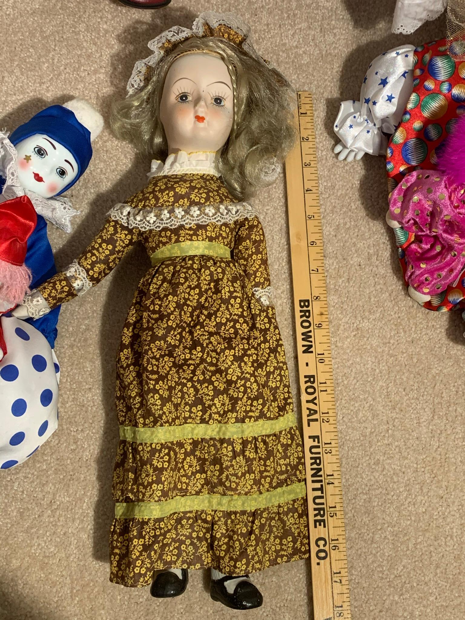 Assortment of Dolls and Clown Dolls.  See Photos