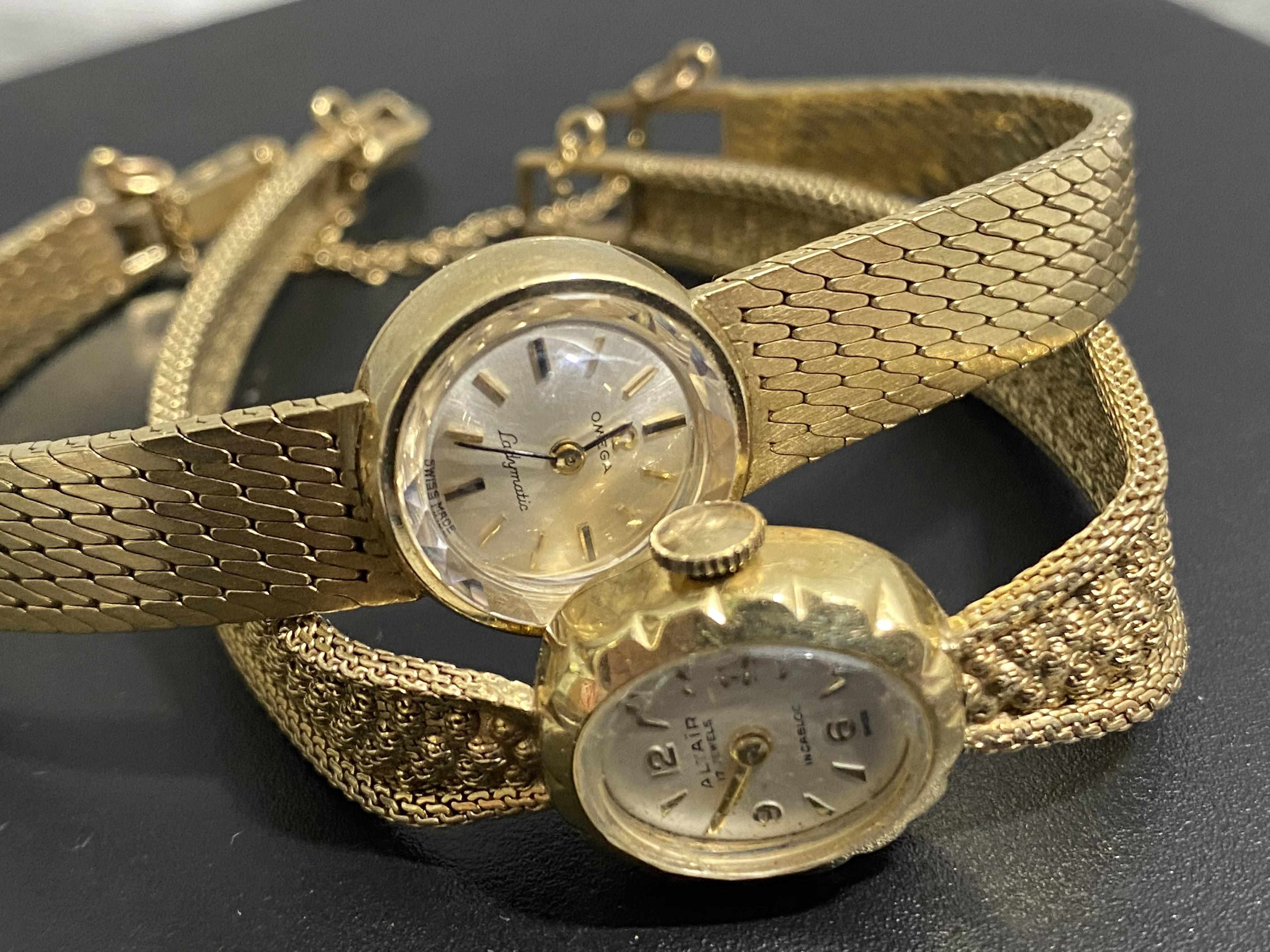 2 14k gold lady's watches heavy 14k gold bands