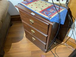 Small cabinet with three drawers