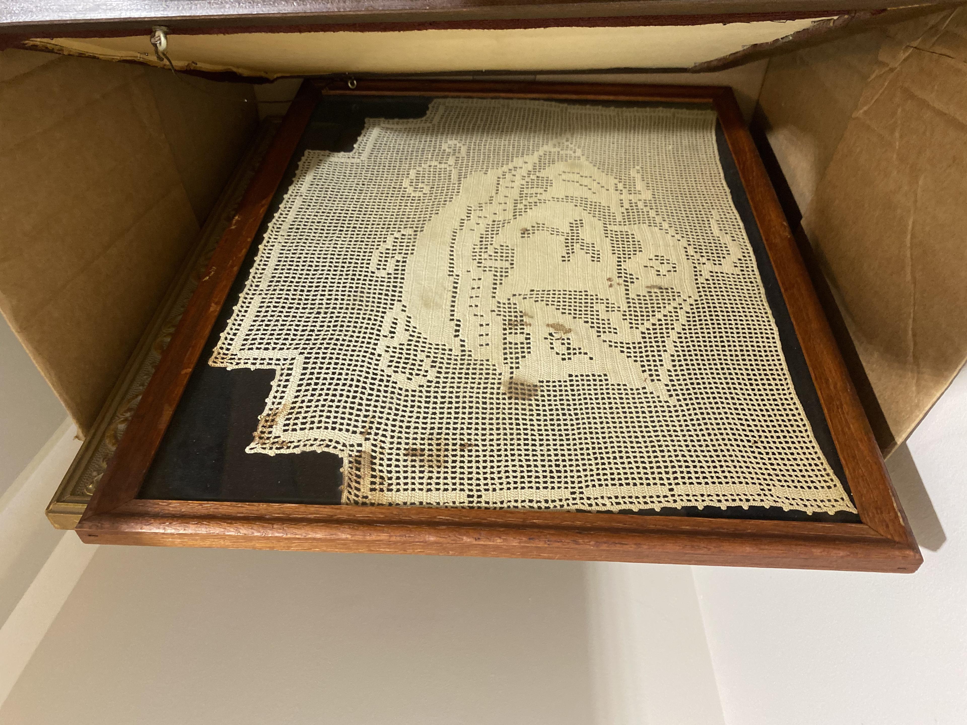 Box of framed Doilies