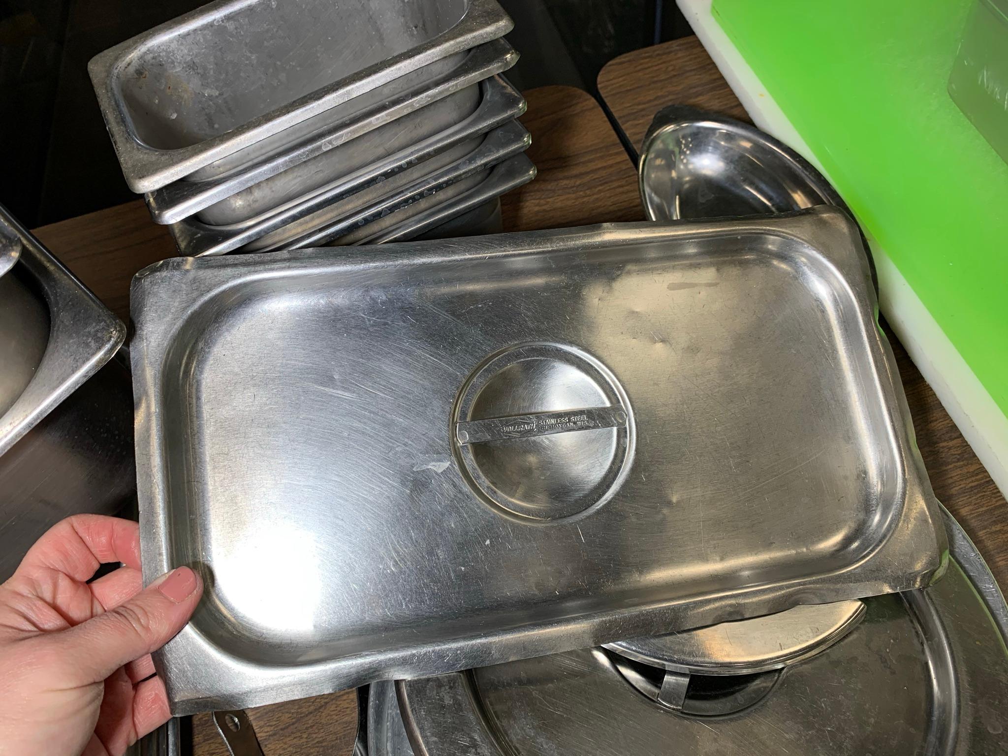 Assortment of Stainless Steel SNF Steam Table Pans, Trays, Lids, and Squeeze Bottle Holder