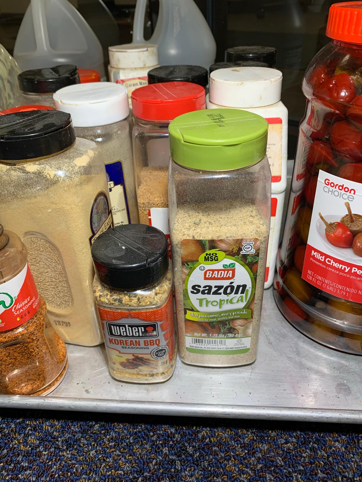 Large Group of Spices, Condiments, Coffee Creamer, and Assorted Kitchen Items