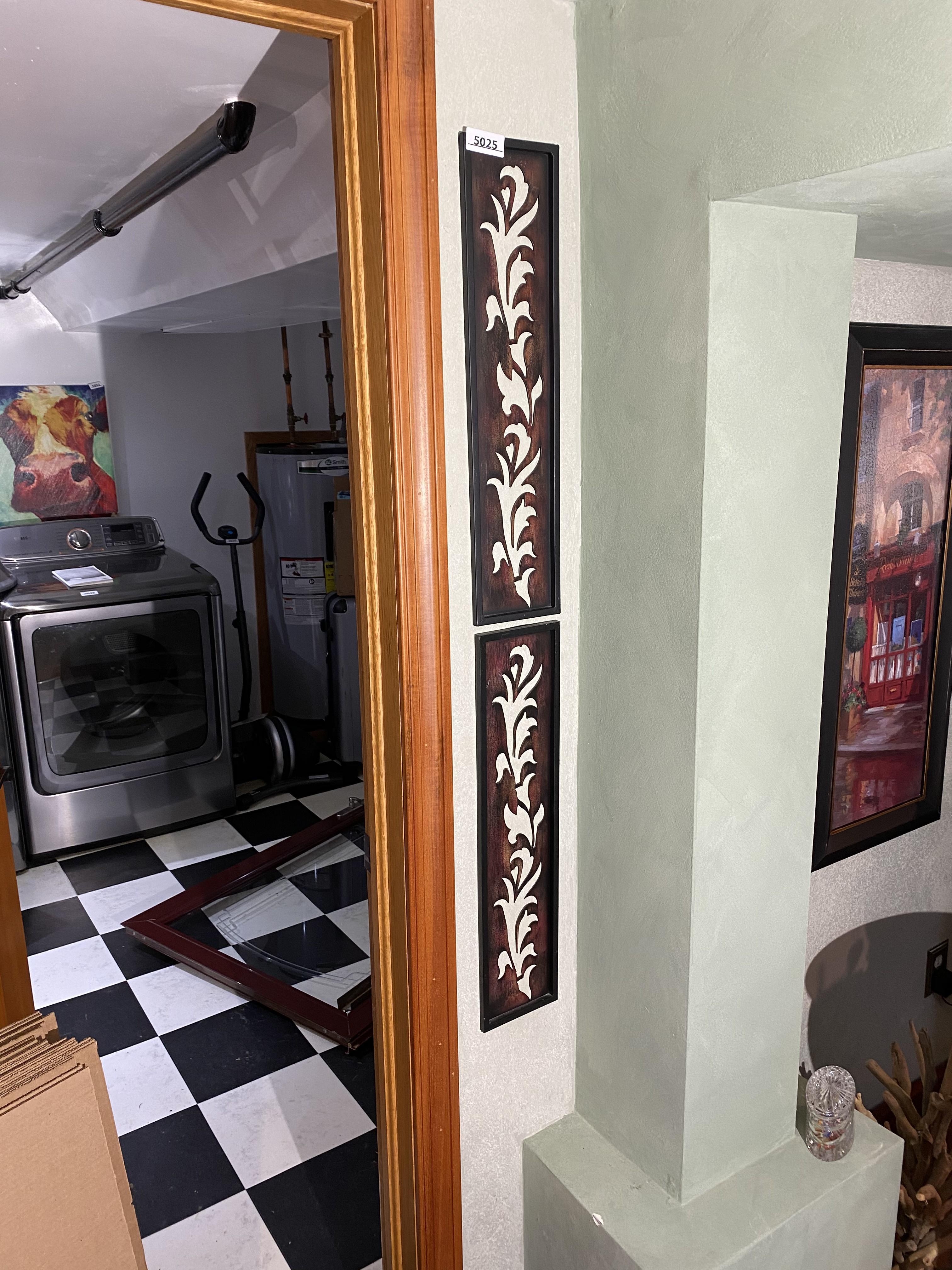 Tile Art and vertical are to the left and right of door frame