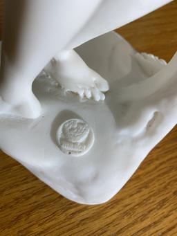 Alabaster sculpture or statue of man and woman kissing