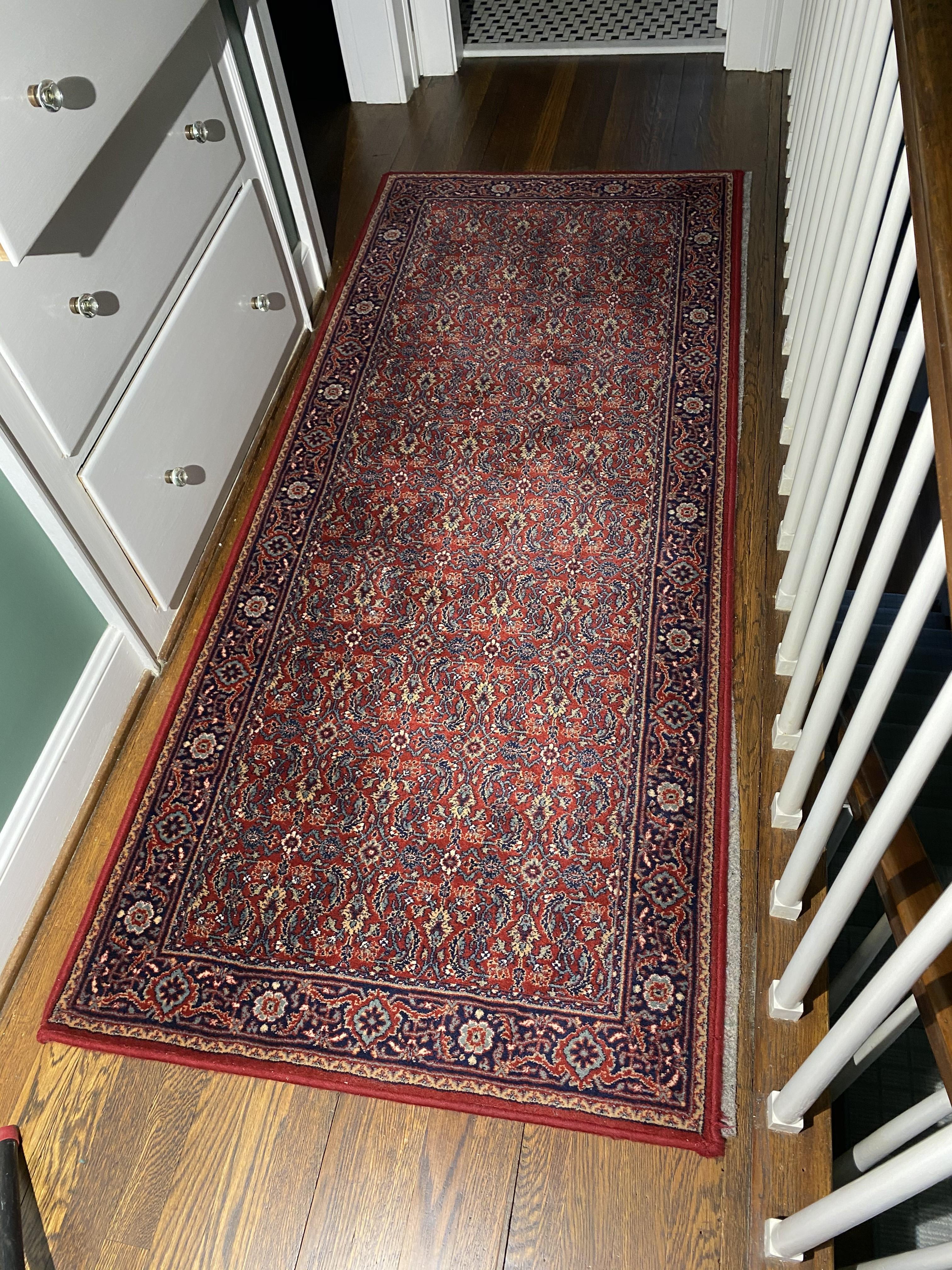 Two nice long hall rugs