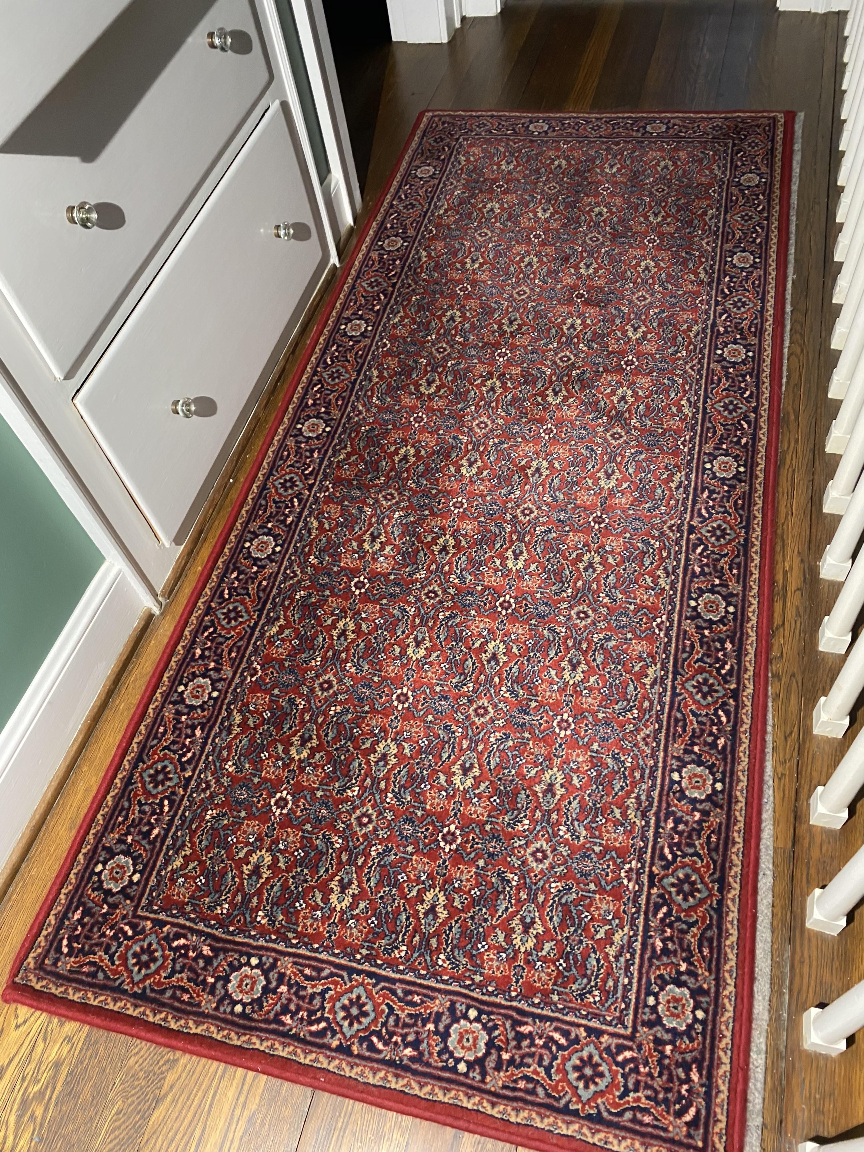 Two nice long hall rugs