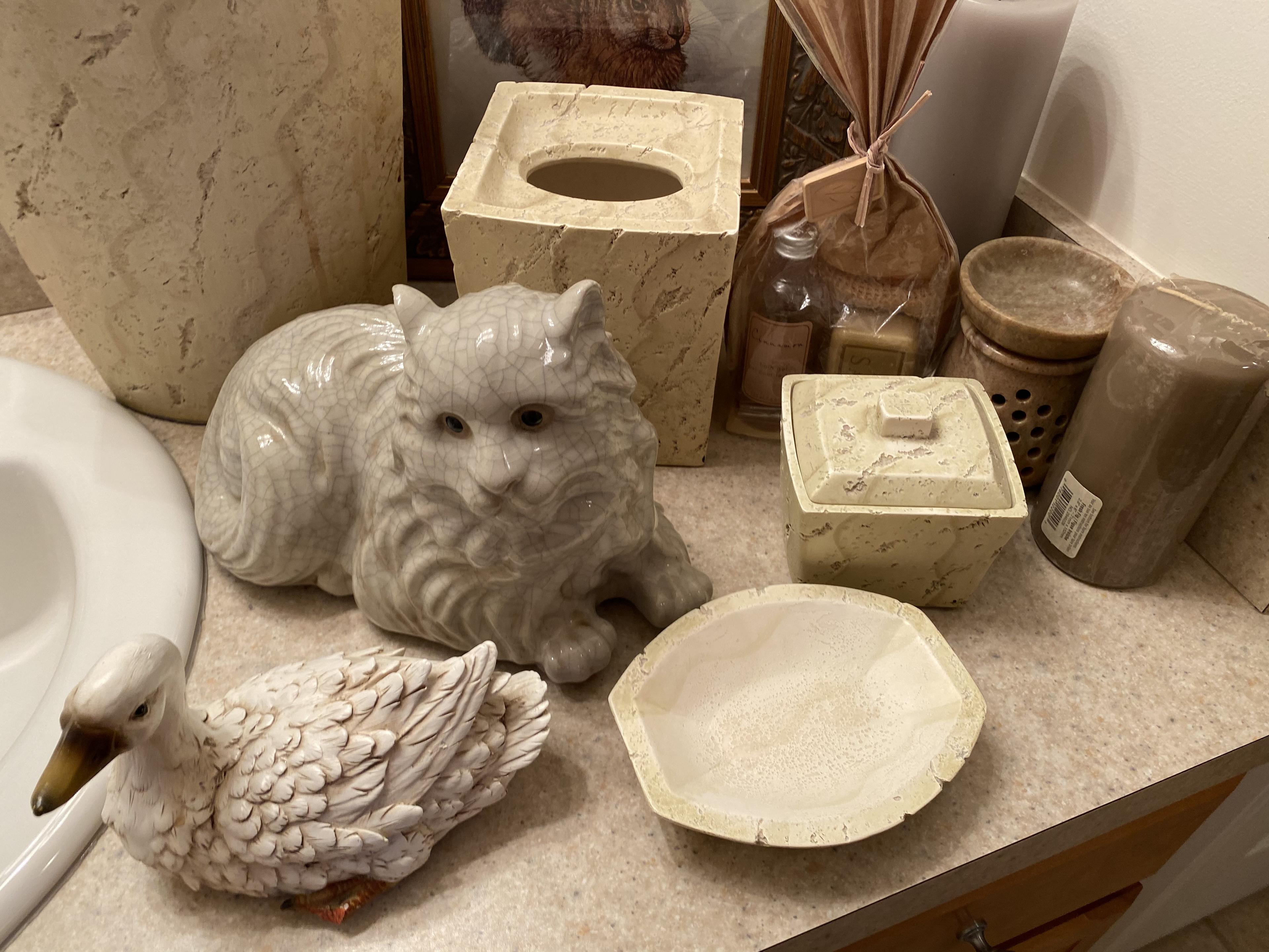 Large lot of decorative items in bathroom