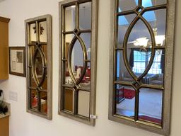 Three decorative mirrors and a frame