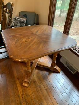 Table, Rocker, Upholstered Chair and Blankets