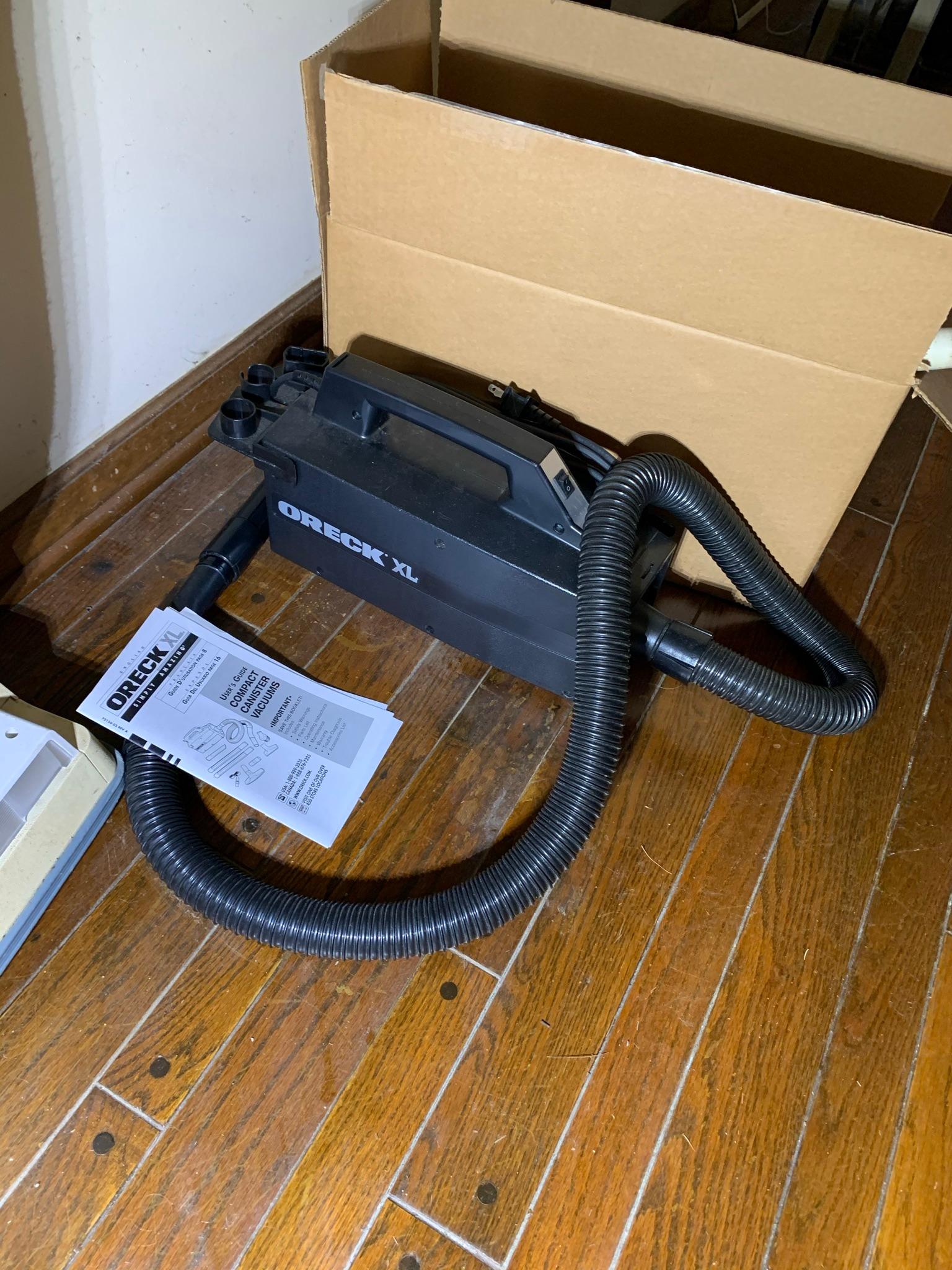 Pair of Oreck XL Vacuums