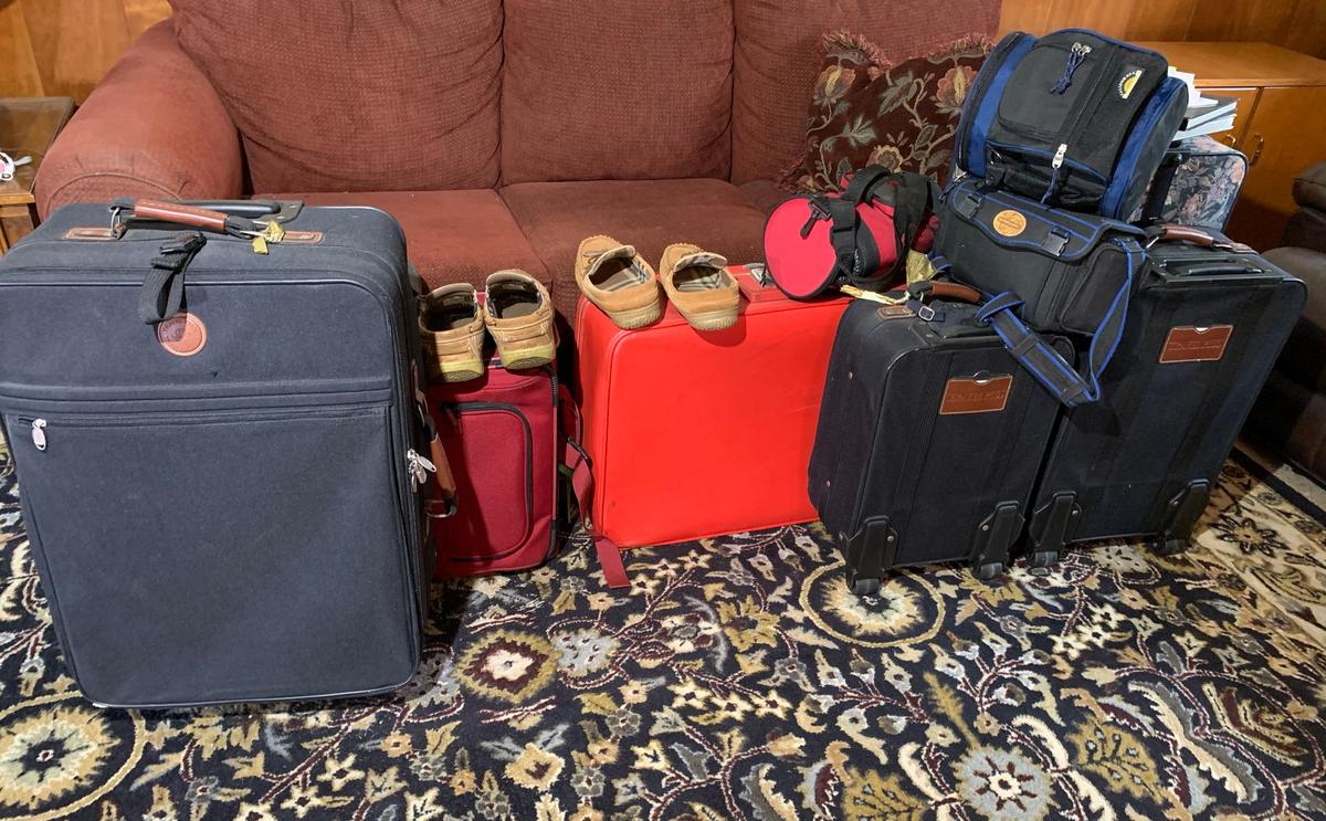 Group of Luggage, Shoes & Books