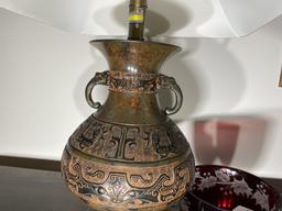 Vinage lamp, red cut glass bowl, Renoir print.