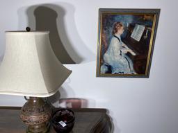 Vinage lamp, red cut glass bowl, Renoir print.