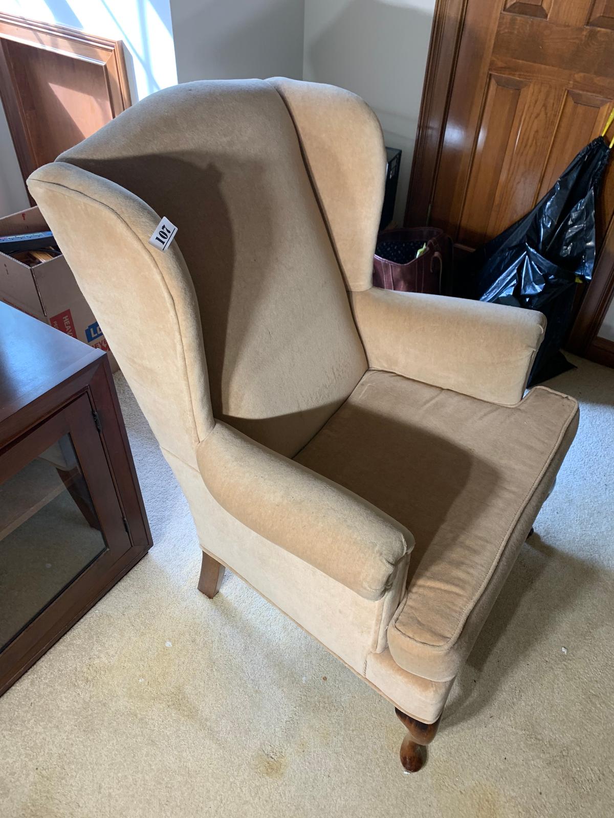 Upholstered armchair