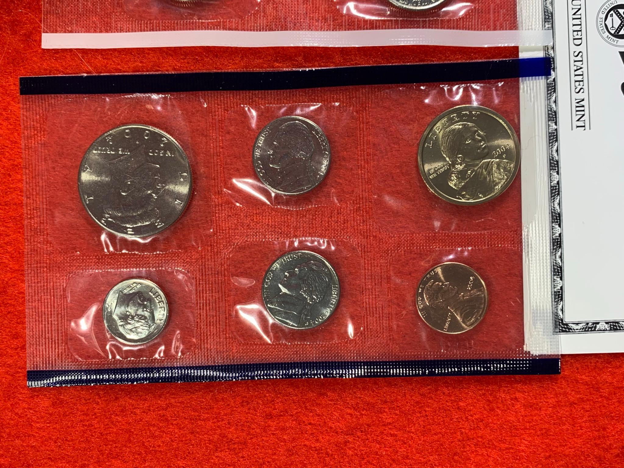 4 Uncirculated Coin Sets - 2002, (2) 2003 coin packets & 2004