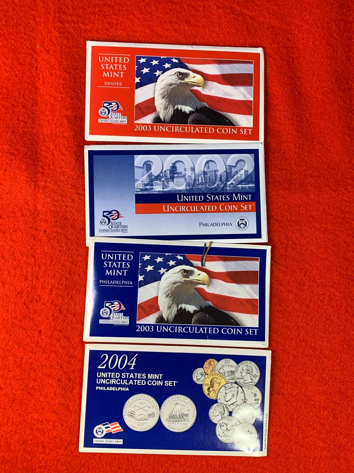 4 Uncirculated Coin Sets - 2002, (2) 2003 coin packets & 2004