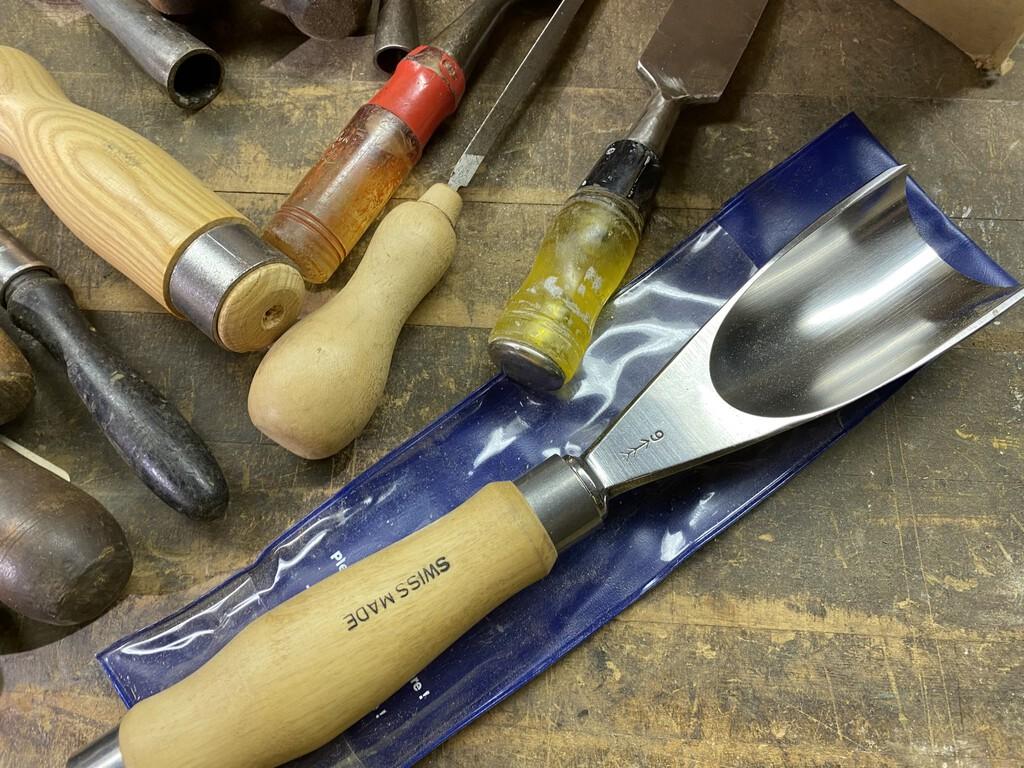 Group lot of better antique and newer chisels, handles