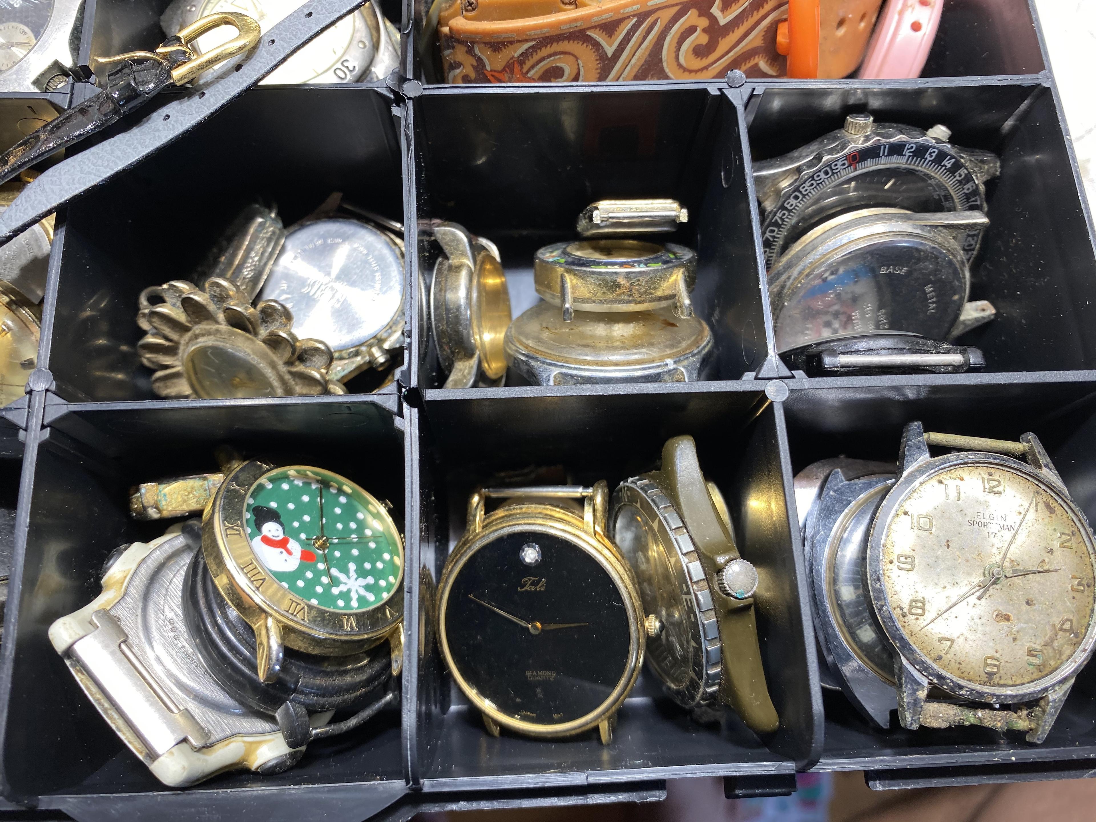 Case lot of assorted vintage watches