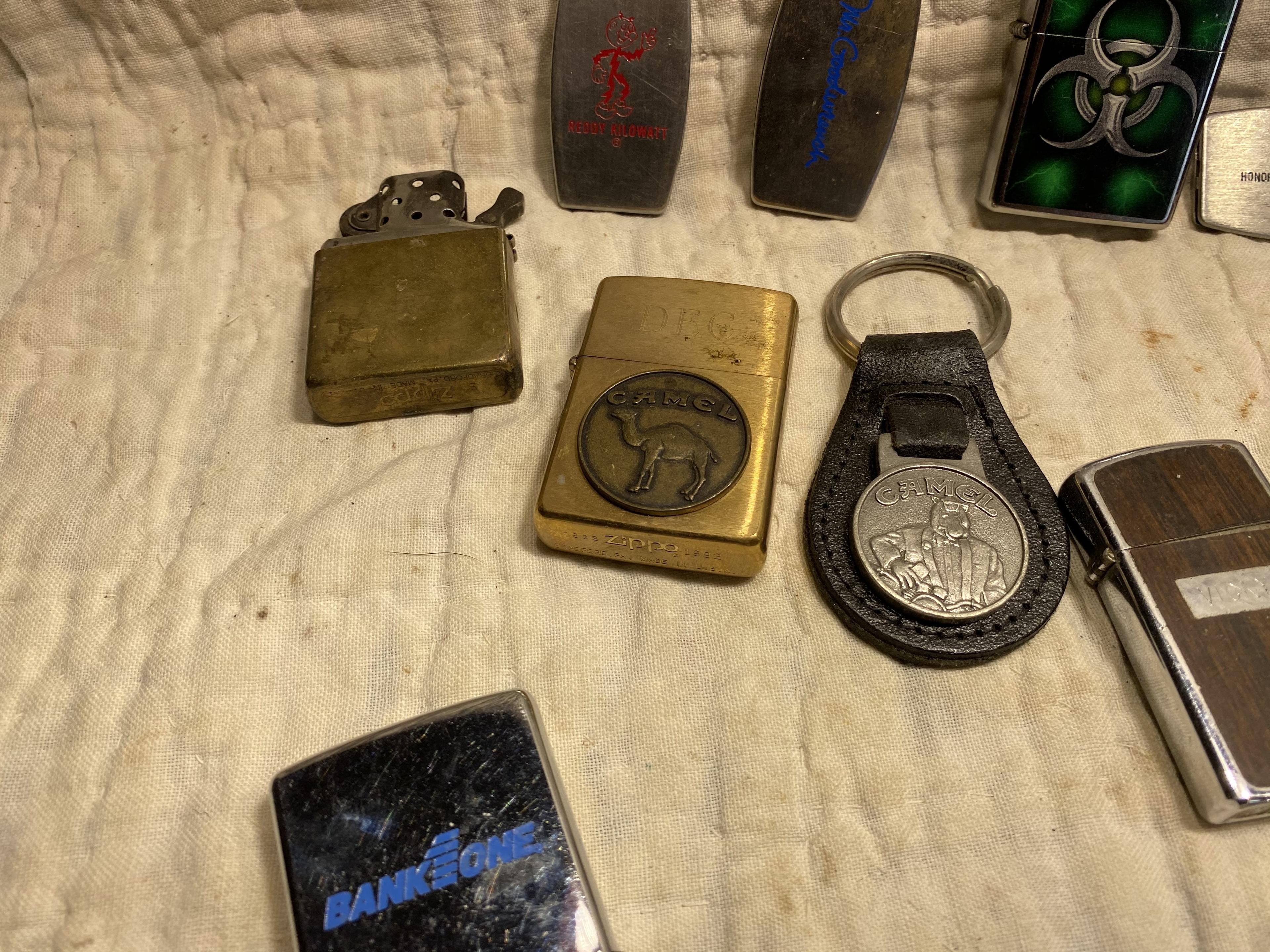 Group lot of assorted Zippo lighters etc